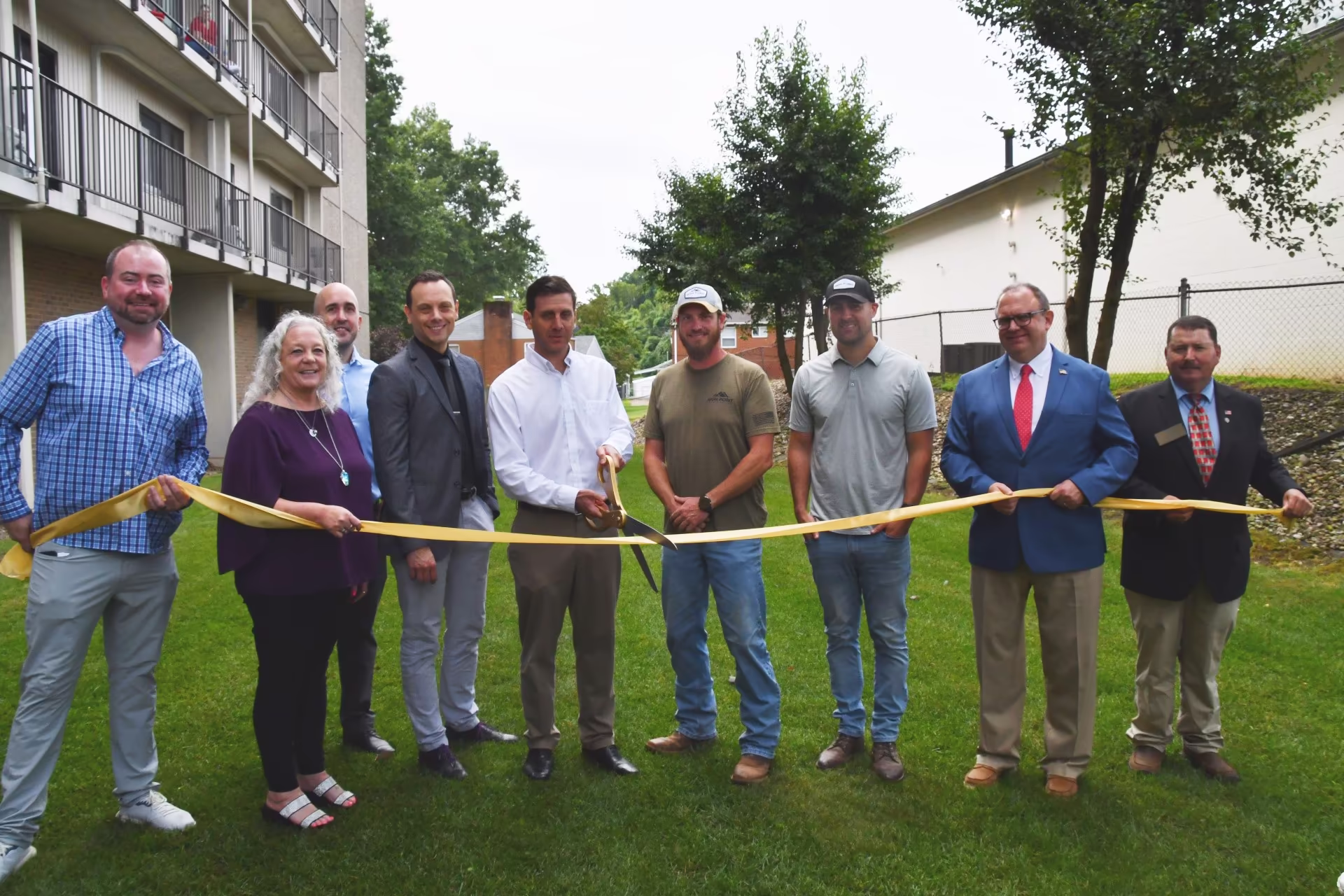 A group of people at the Parkland ribbon cutting ceremony