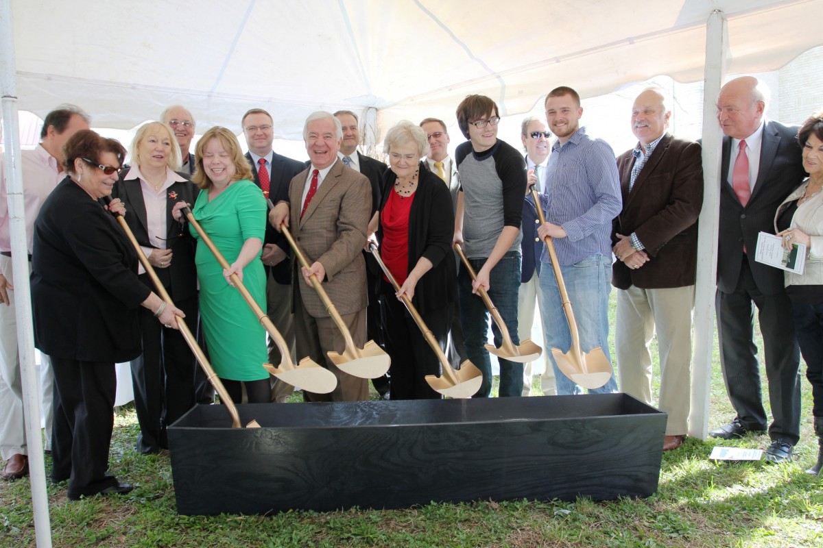 Dignitaries and elected leaders from across West Virginia gather for a ceremonial groundbreaking at the James H. Booton Memorial Apartments in Wayne, W.Va. The West Virginia Housing Development Fund helped finance the development. In addition to being West Virginia’s leader in affordable mortgage finance, the Fund has a number of programs to help developers of multi-family rental units. 